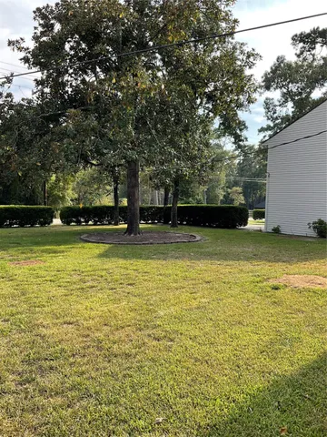 a view of a swimming pool and outdoor space