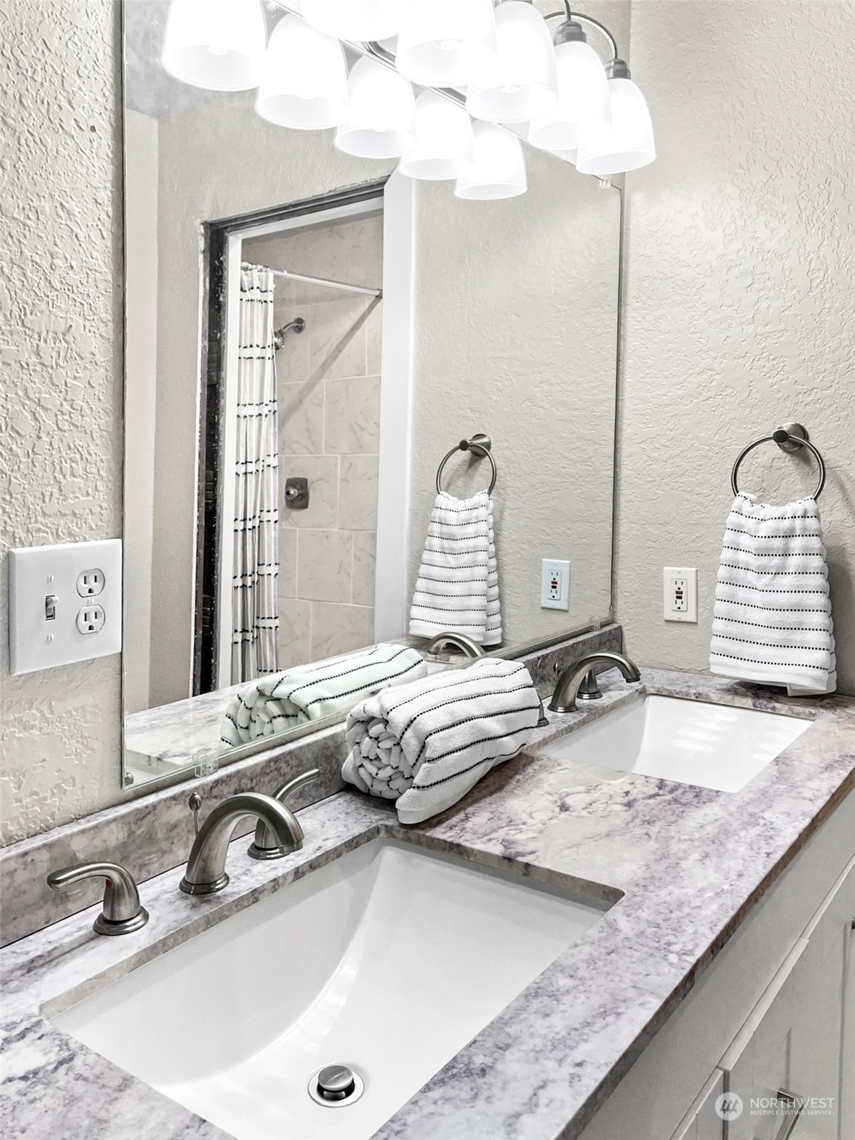 14401 Southeast Petrovitsky Road, Unit C103 Renton, WA 98058 - Photo 11 of 29 a bathroom with a granite countertop sink and a mirror