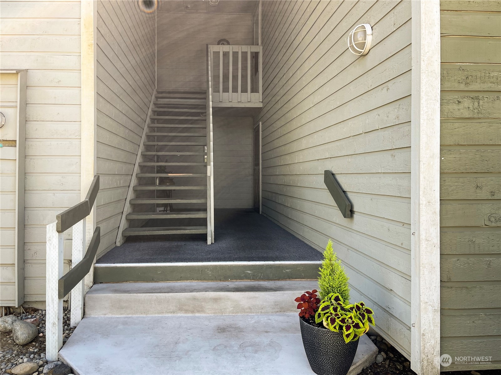 14401 Southeast Petrovitsky Road, Unit C103 Renton, WA 98058 - Photo 21 of 29 a view of entryway with a flower pots