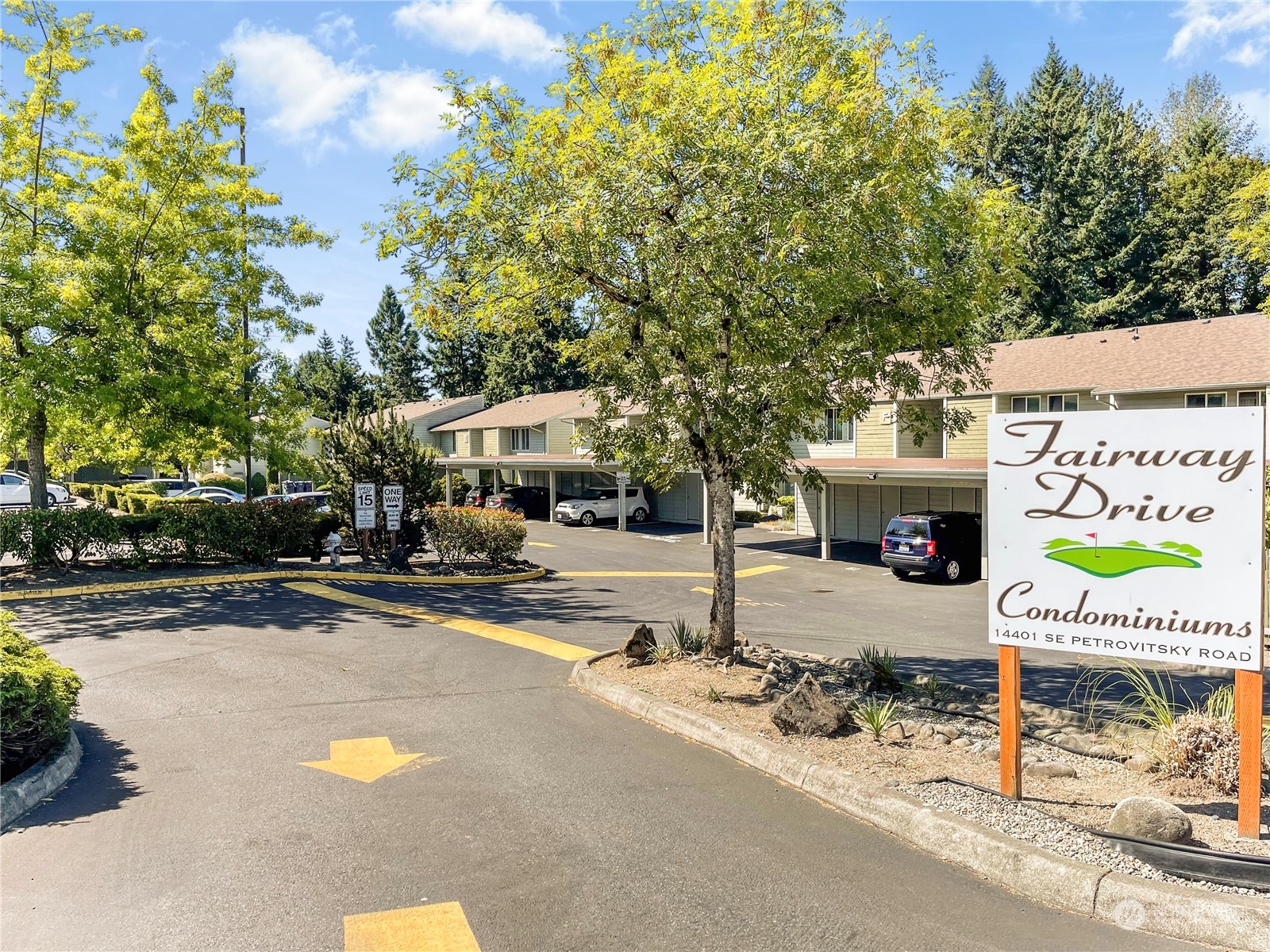 14401 Southeast Petrovitsky Road, Unit C103 Renton, WA 98058 - Photo 24 of 29 a view of street with parked cars