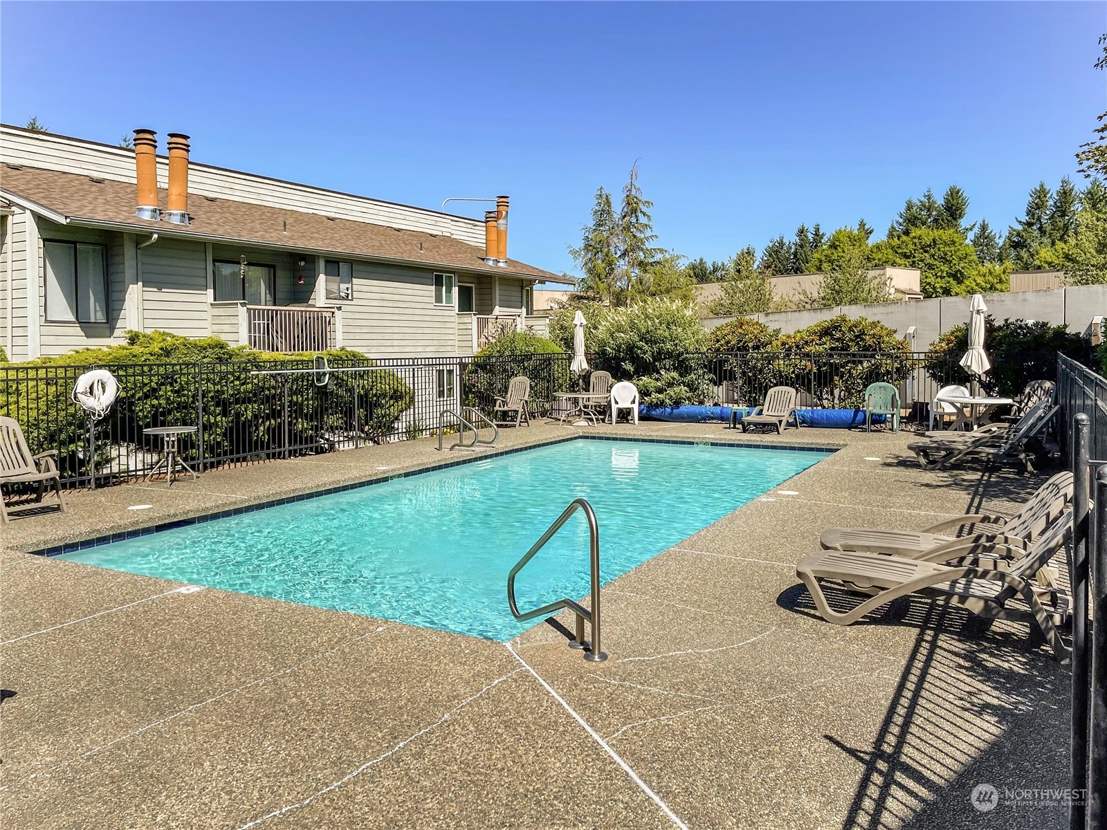 14401 Southeast Petrovitsky Road, Unit C103 Renton, WA 98058 - Photo 25 of 29 a view of a house with sitting area and furniture