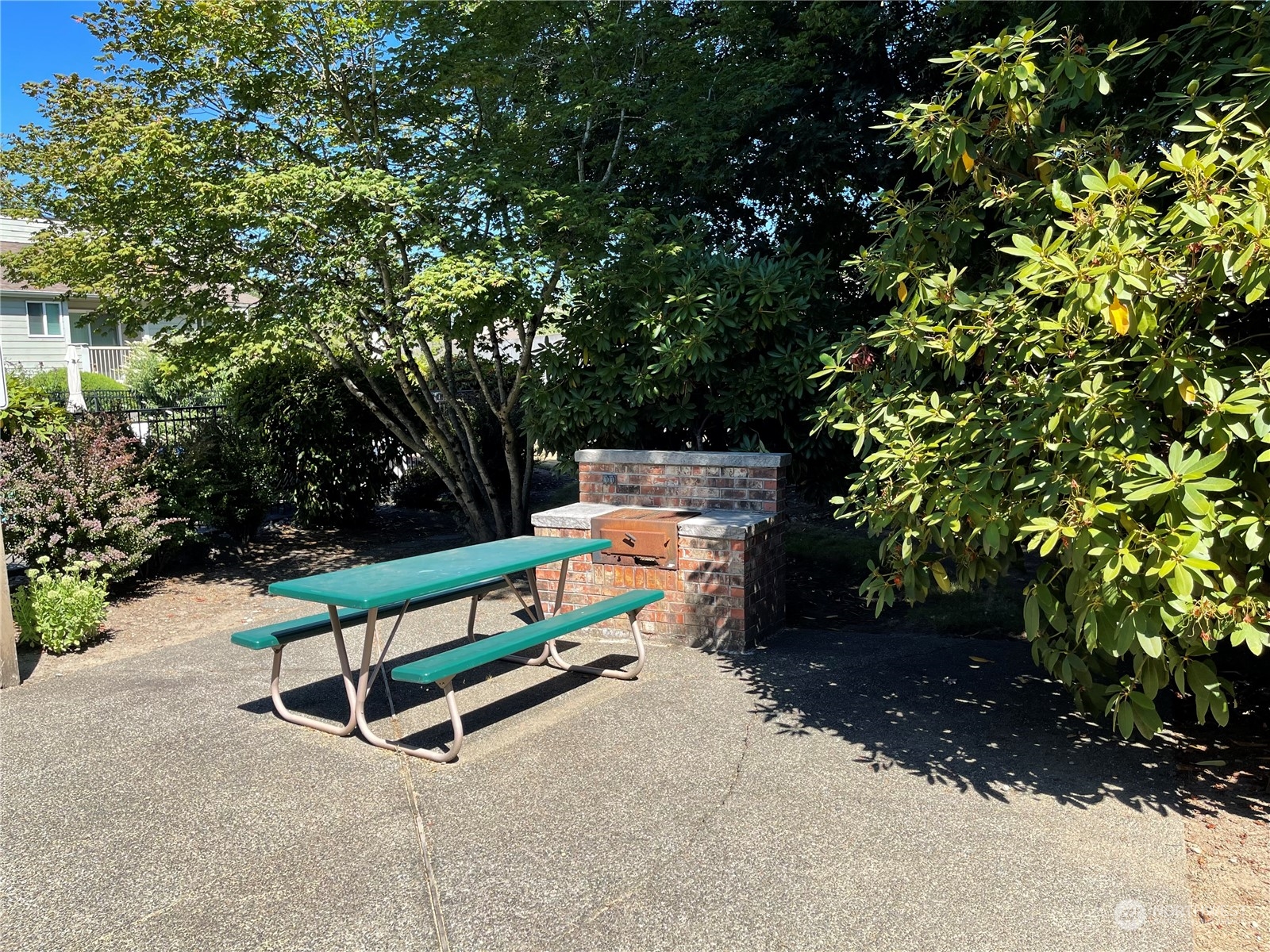 14401 Southeast Petrovitsky Road, Unit C103 Renton, WA 98058 - Photo 27 of 29 a park view with a bench