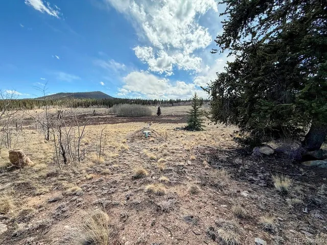 a view of lake with mountain