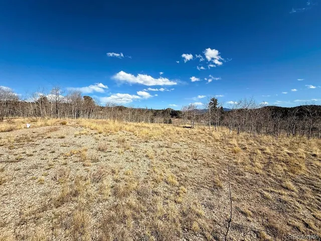 a view of a pathway with a lake