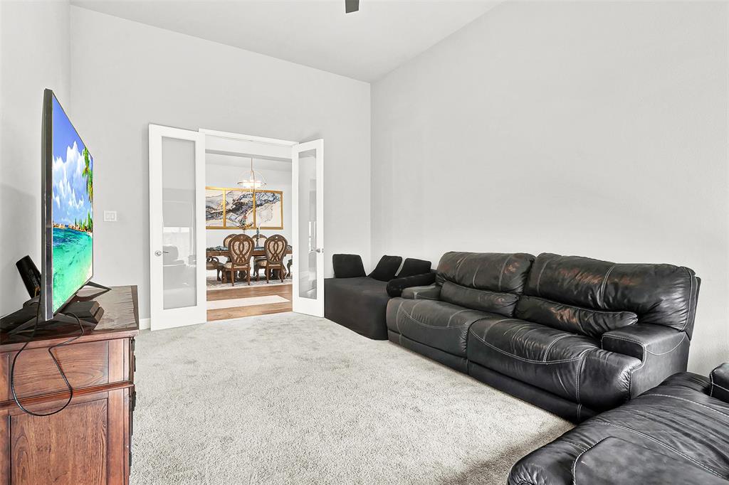 1004 Open Range Drive Mansfield, TX 76063 - Photo 21 of 40 a living room with furniture and a large window