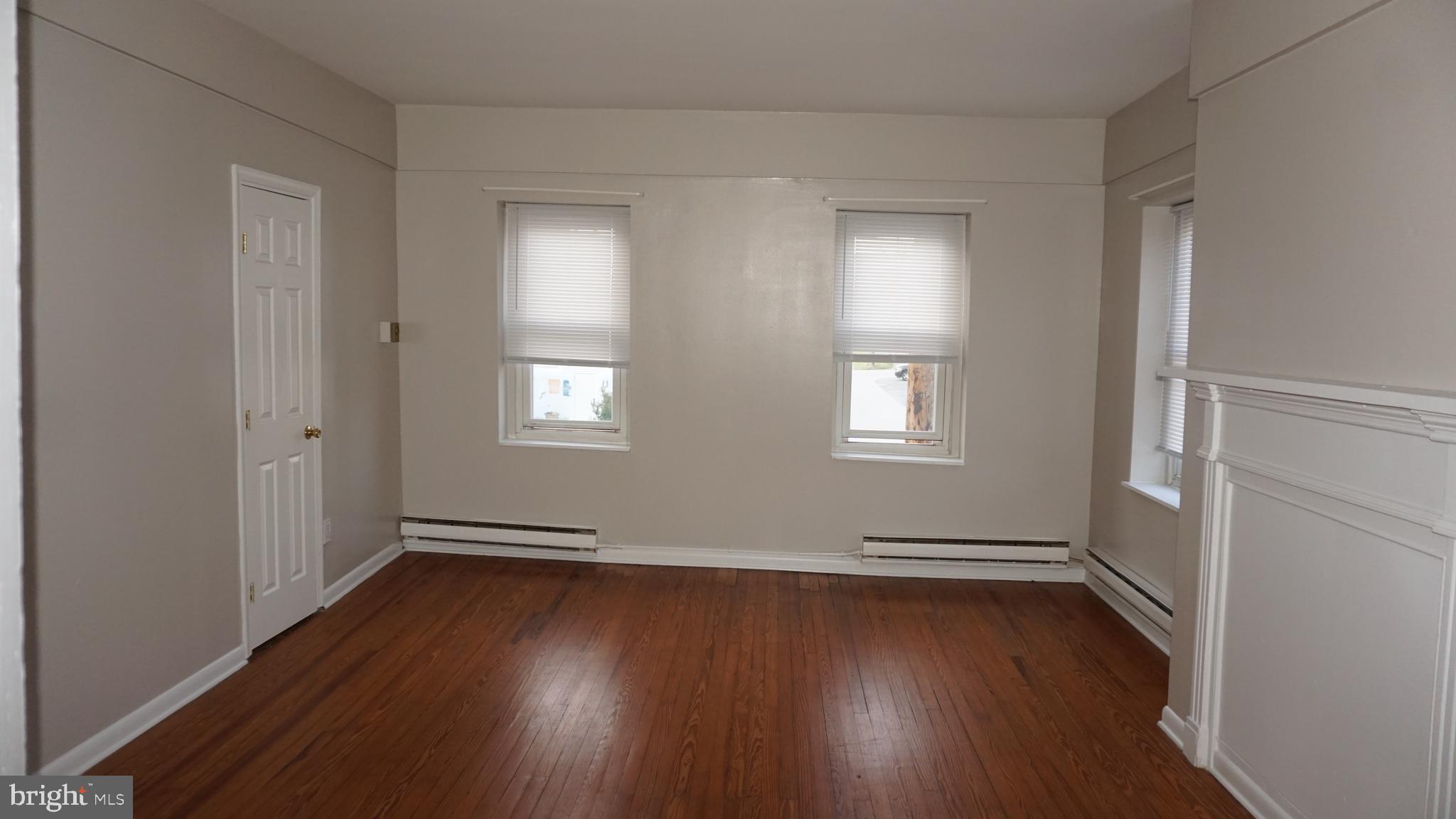 276 East Main Street, Unit 4 Westminster, MD 21157 - Photo 13 of 26 a view of wooden floor and windows in a room