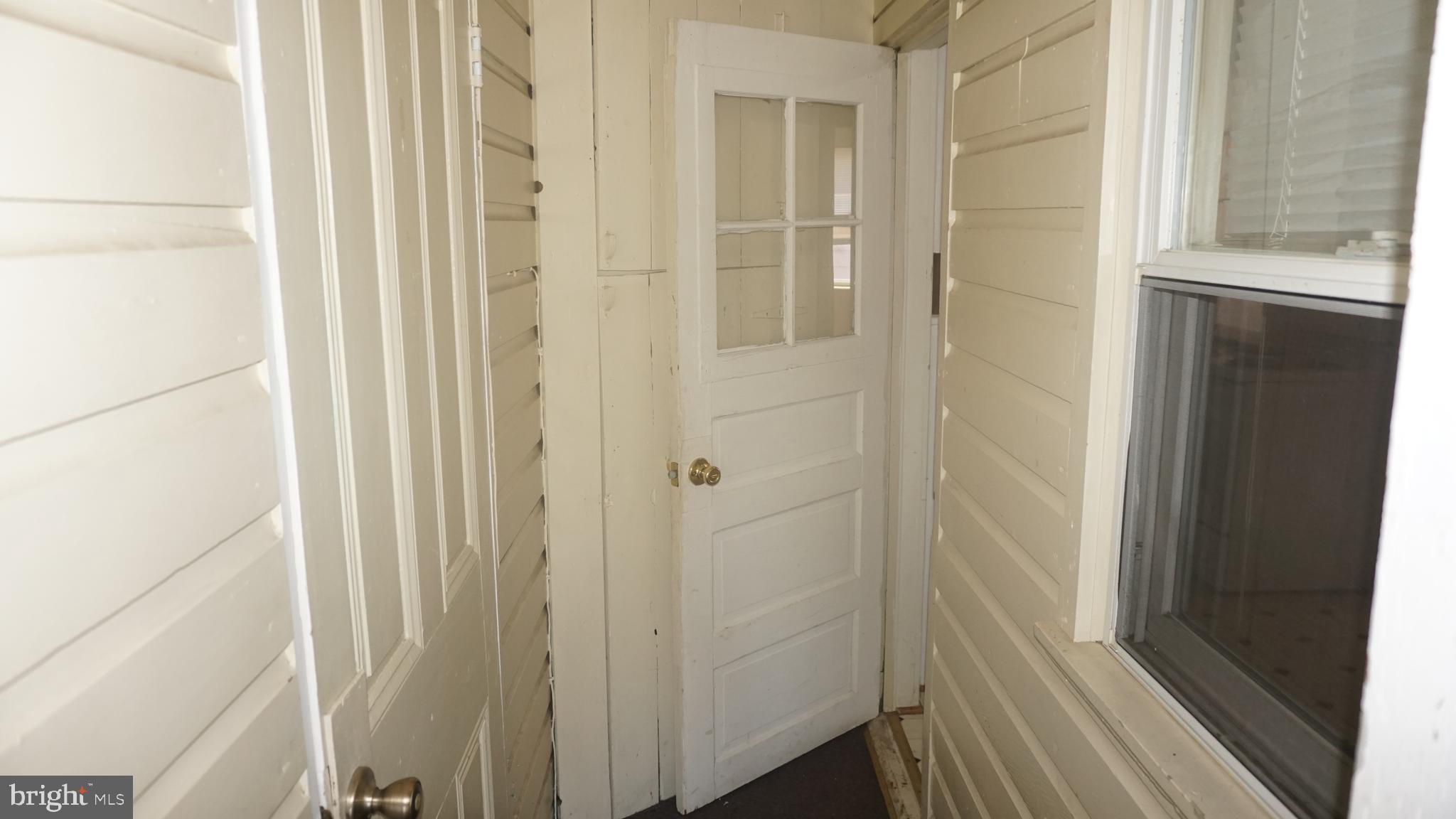 276 East Main Street, Unit 4 Westminster, MD 21157 - Photo 20 of 26 a view of a bathroom from a hallway