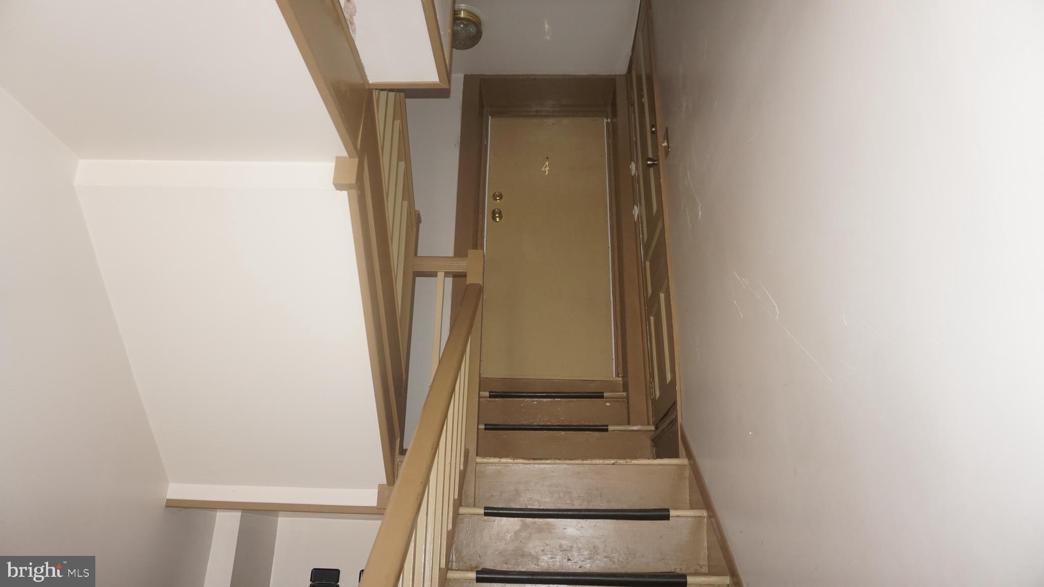 276 East Main Street, Unit 4 Westminster, MD 21157 - Photo 2 of 26 a view of staircase with white walls