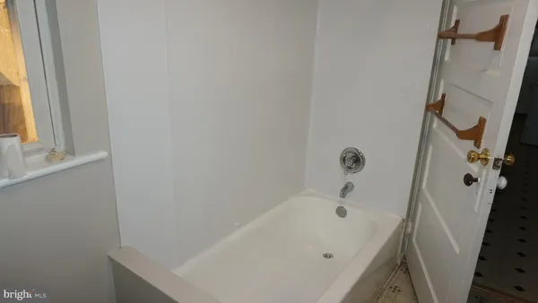 a bathroom with a bathtub