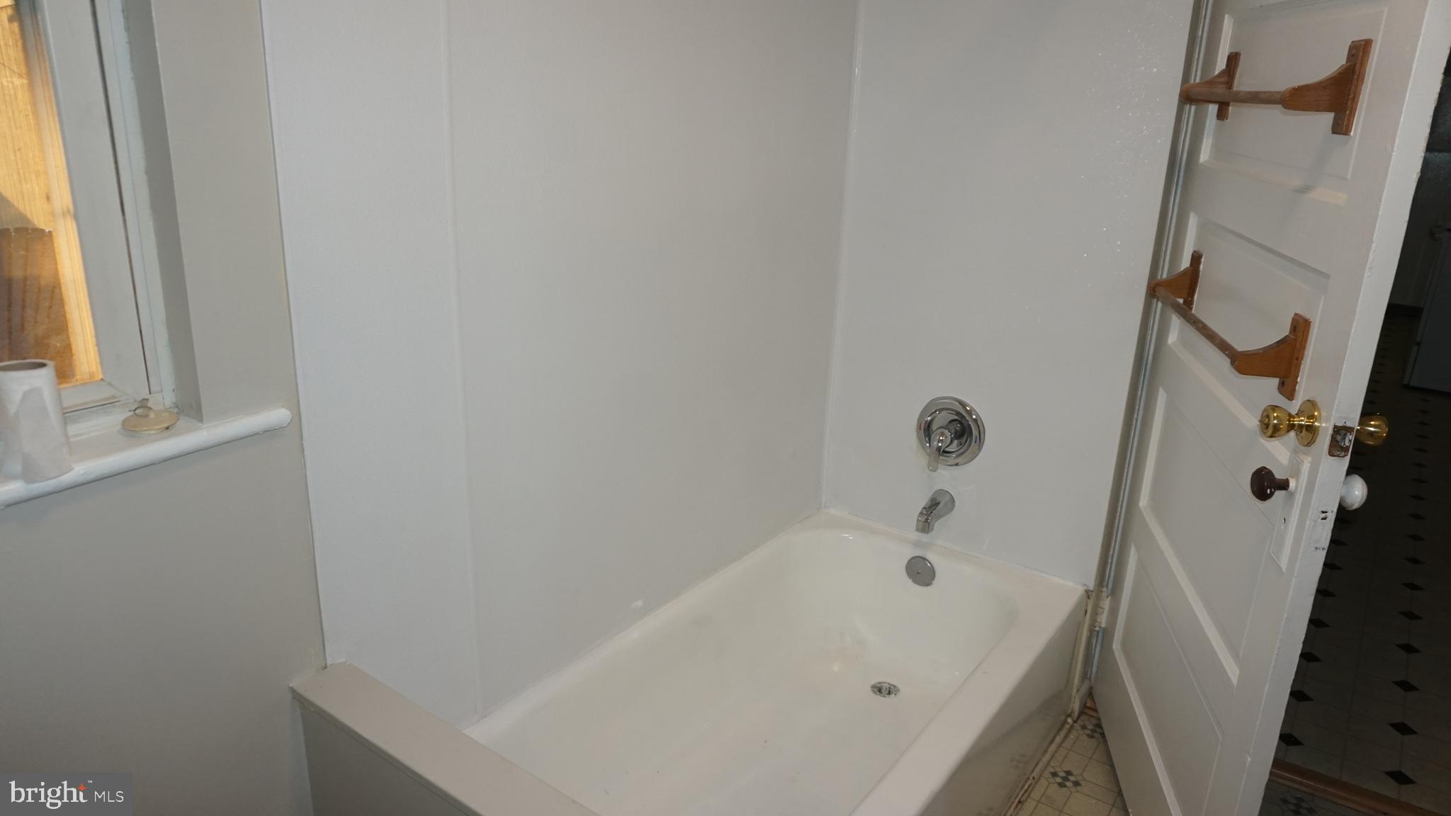 276 East Main Street, Unit 4 Westminster, MD 21157 - Photo 9 of 26 a bathroom with a bathtub