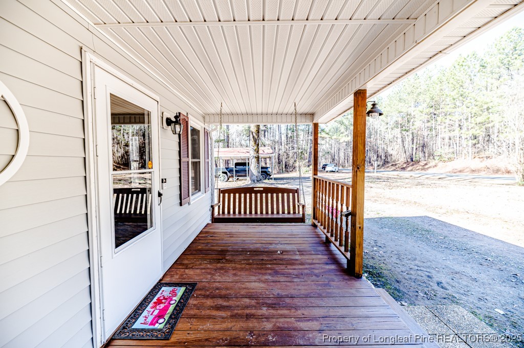 476 Riddle Road Sanford, NC 27330 - Photo 3 of 34 a view of a balcony