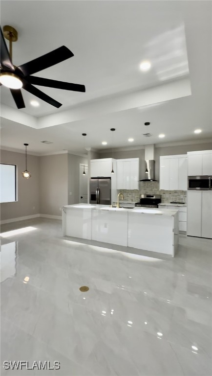 113 Connecticut Road Lehigh Acres, FL 33936 - Photo 2 of 6 a view of kitchen with kitchen island a sink stainless steel appliances and cabinets