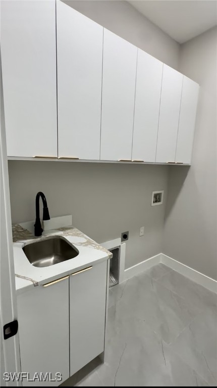 113 Connecticut Road Lehigh Acres, FL 33936 - Photo 6 of 6 a kitchen with a sink and cabinets