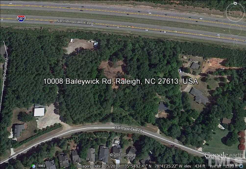 10008 Baileywick Road Raleigh, NC 27613 - Photo 3 of 3 a terrace with outdoor seating and trees