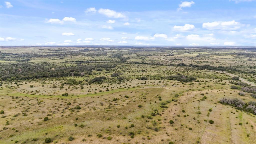 2486 & Cr Hamilton, TX 76531 - Photo 18 of 31 a view of a yard with an outdoor space