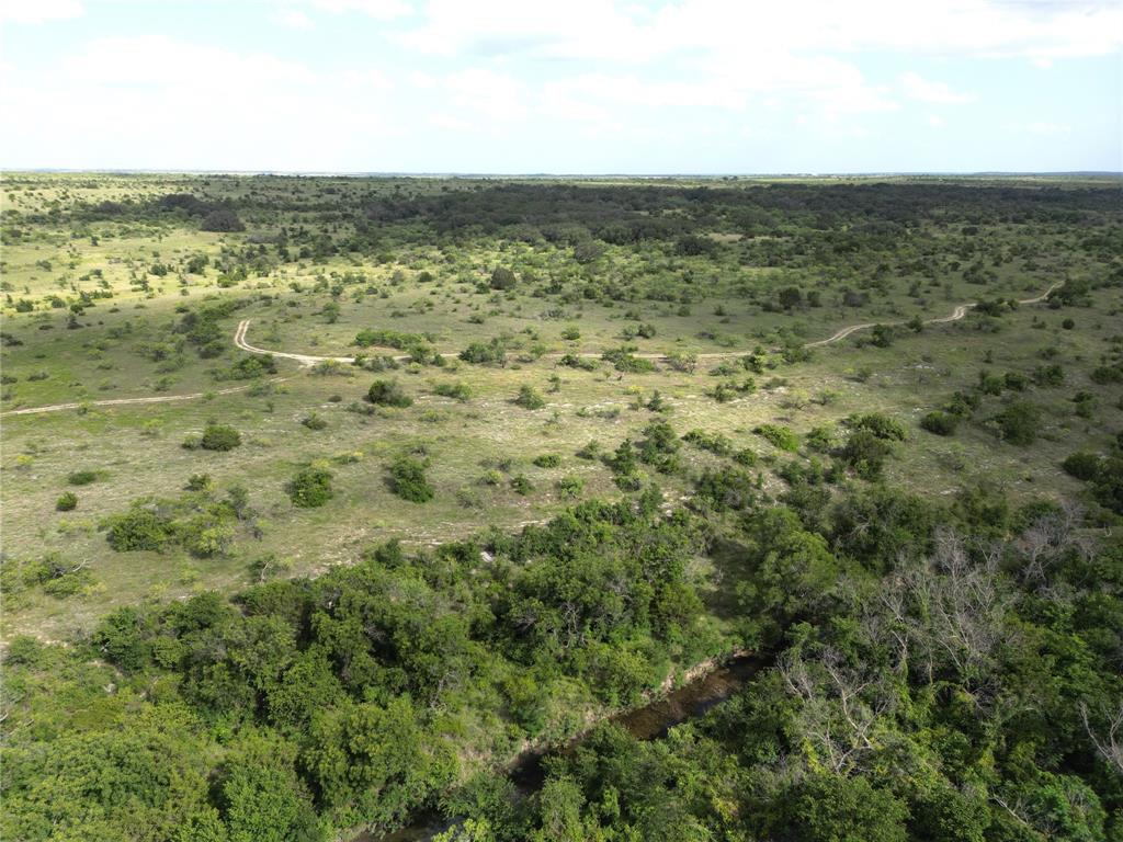 2486 & Cr Hamilton, TX 76531 - Photo 24 of 31 a view of a city with an ocean