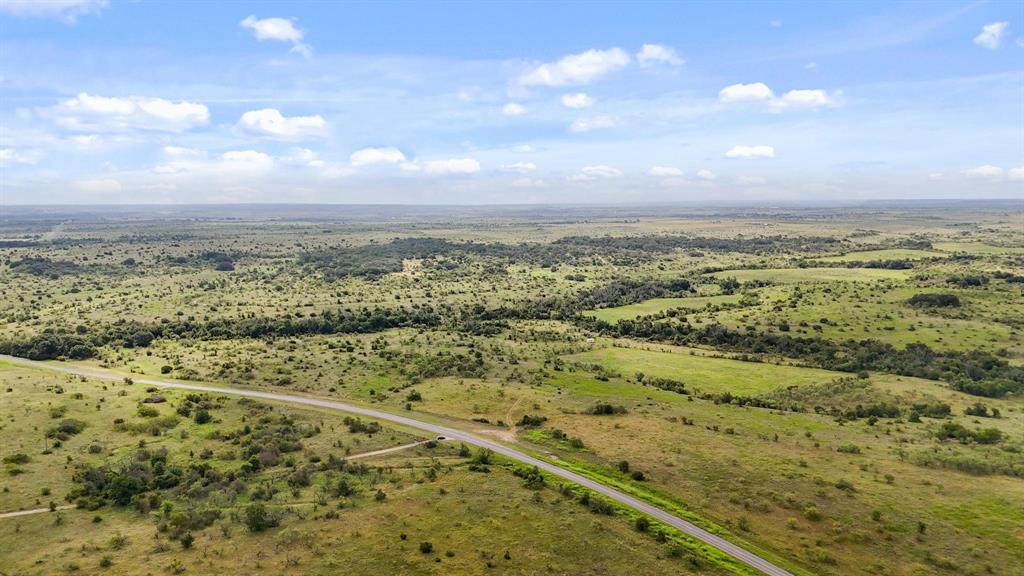 2486 & Cr Hamilton, TX 76531 - Photo 4 of 31 a view of a city with lots of trees