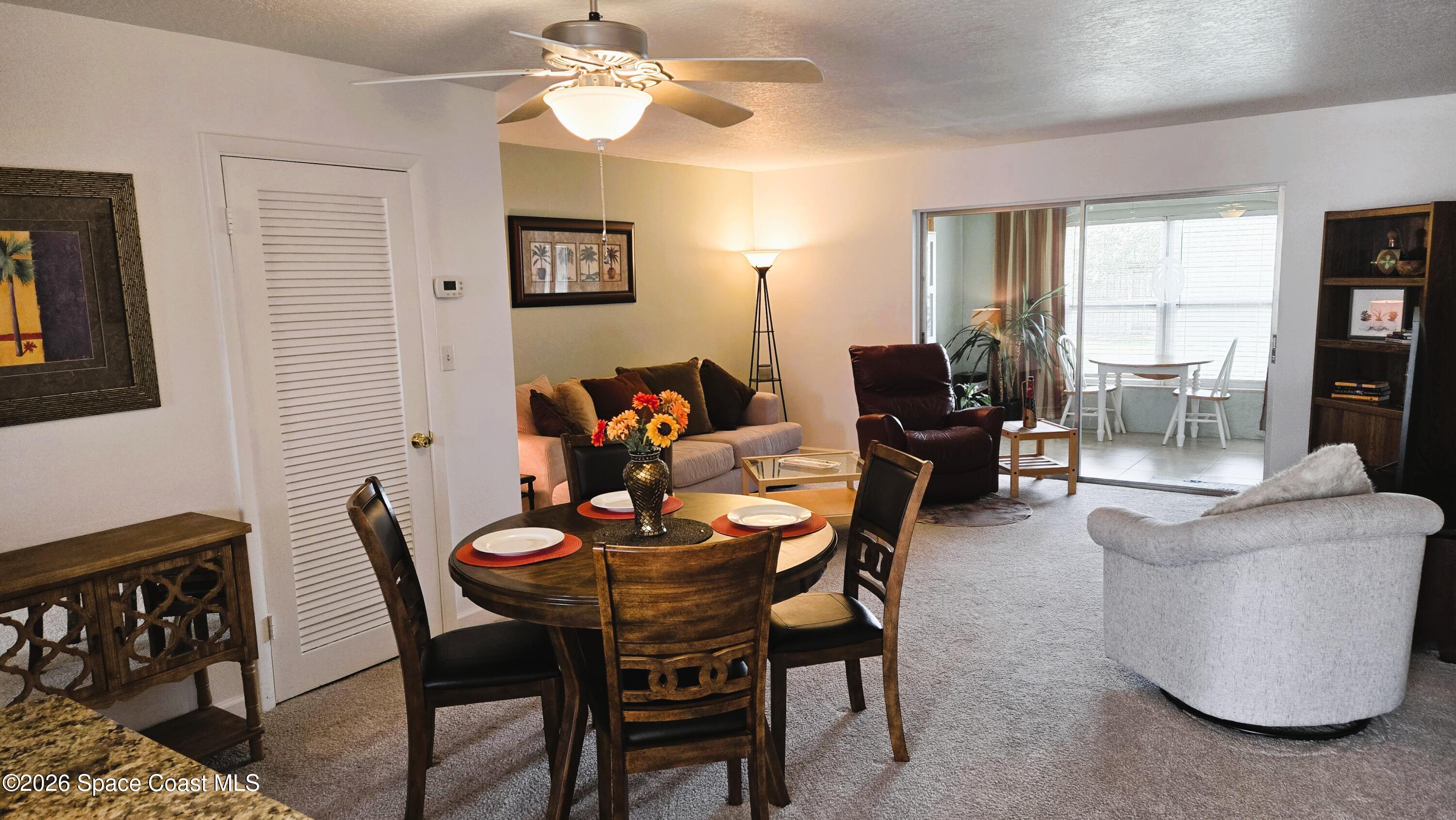 412 School Road, Unit 88 Indian Harbour Beach, FL 32937 - Photo 7 of 50 Dining/Living Room