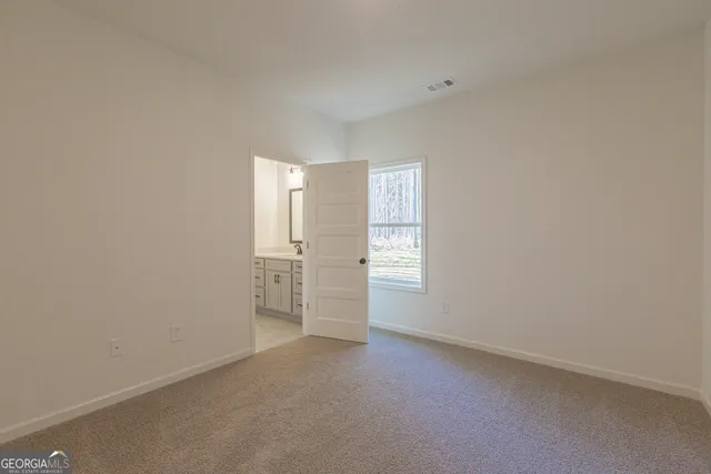 a house with yard in front of it