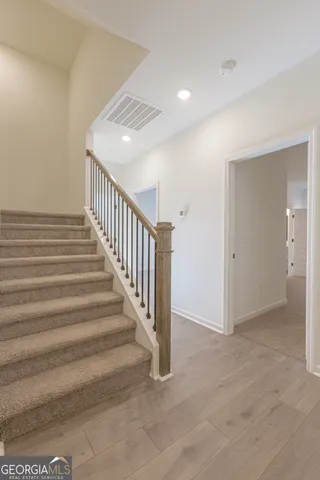 a view of pool in front of house
