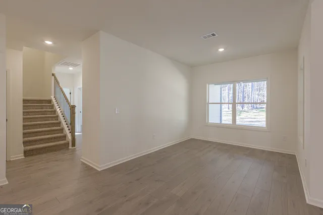 a view of a road with a yard