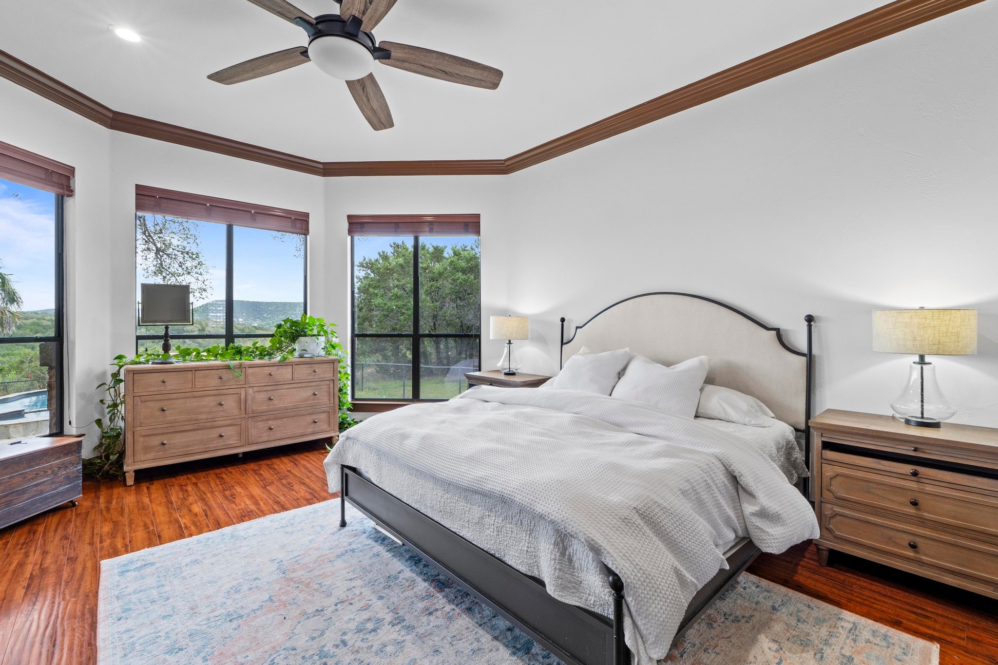 8211 Moon Rise Trail Jonestown, TX 78645 - Photo 17 of 34 The large master suite brings you even more of those gorgeous views! There is also a french door off of the bedroom allowing you access to the back patio.