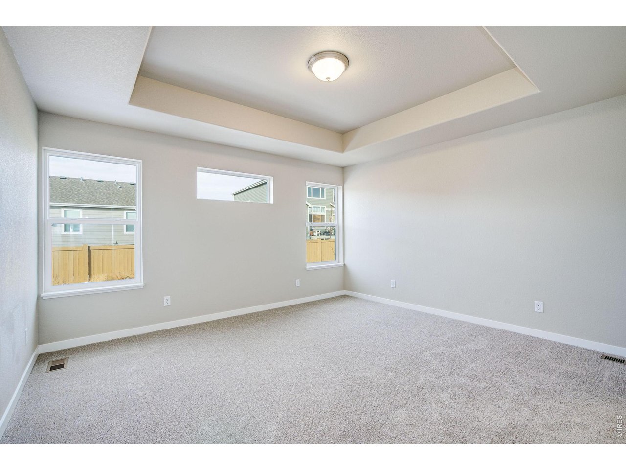 7040 Feather Reed Drive Wellington, CO 80549 - Photo 17 of 32 a view of an empty room with a window