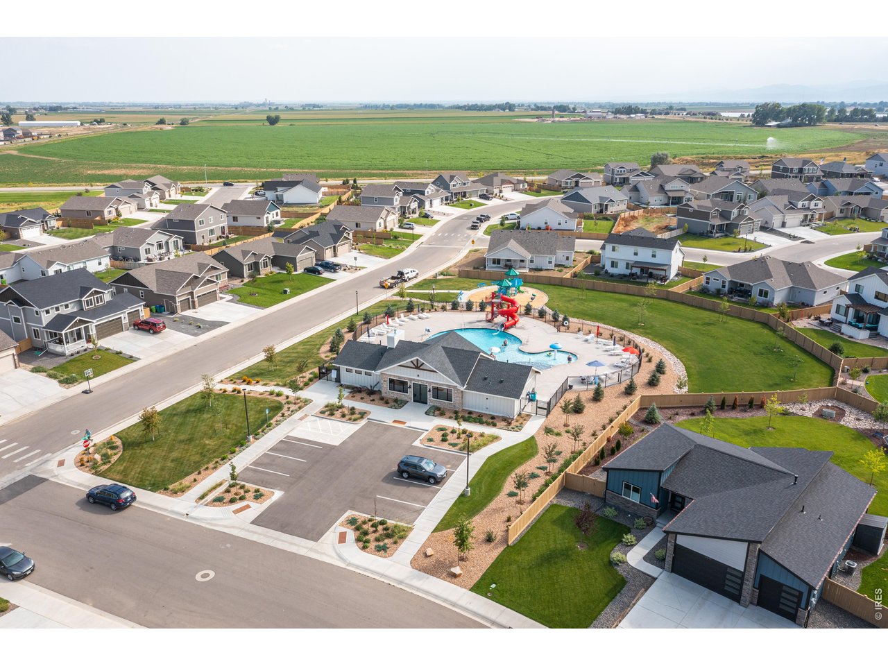 7040 Feather Reed Drive Wellington, CO 80549 - Photo 32 of 32 an aerial view of a house with a garden