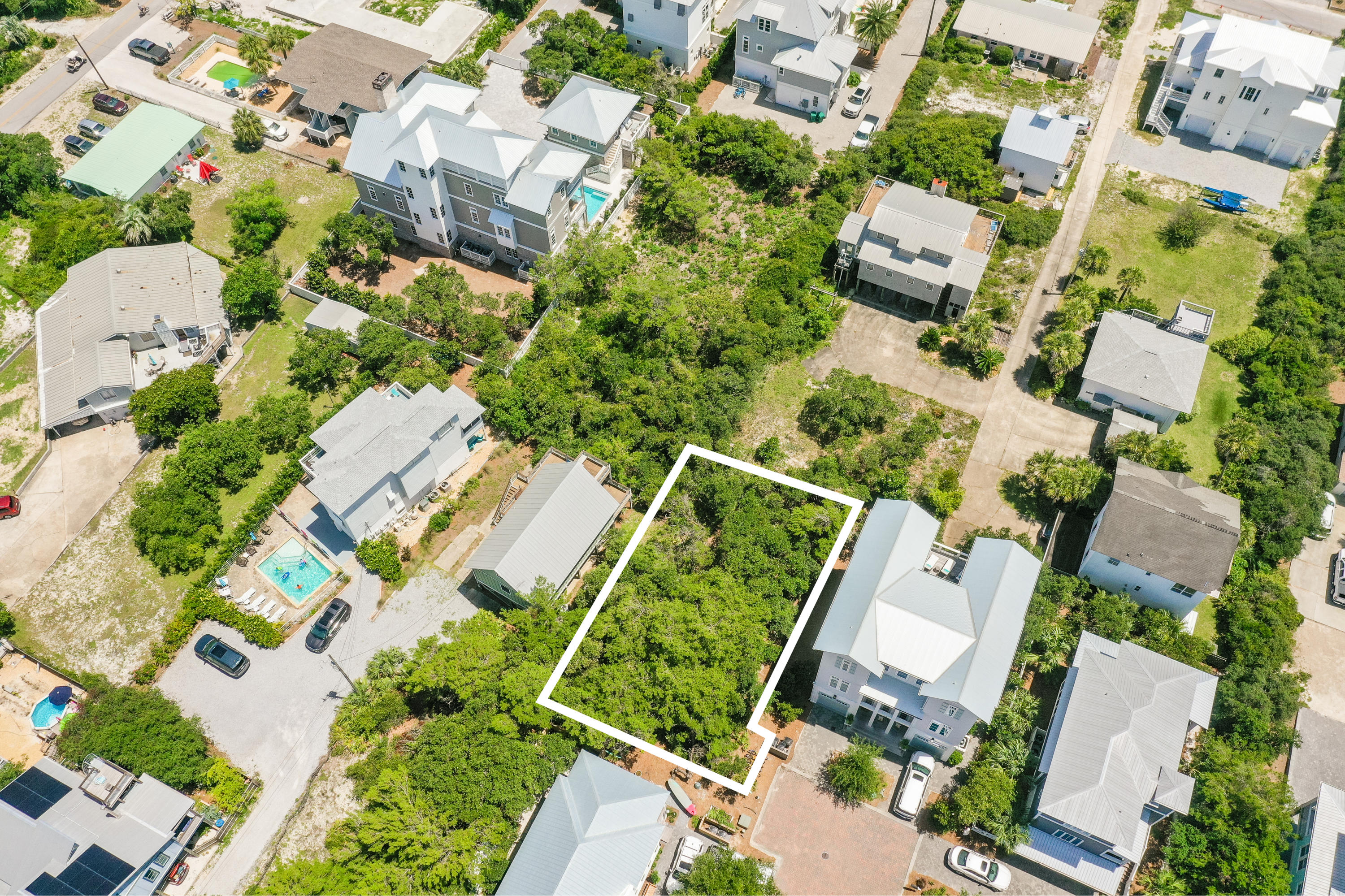 Lot 5 Wild Dunes Way Inlet Beach Inlet Beach, FL 32461 - Photo 4 of 5 an aerial view of a house with a yard