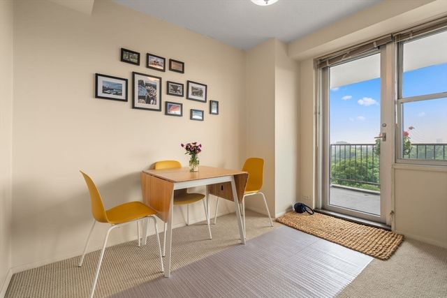 a view of a livingroom with furniture and wooden floor