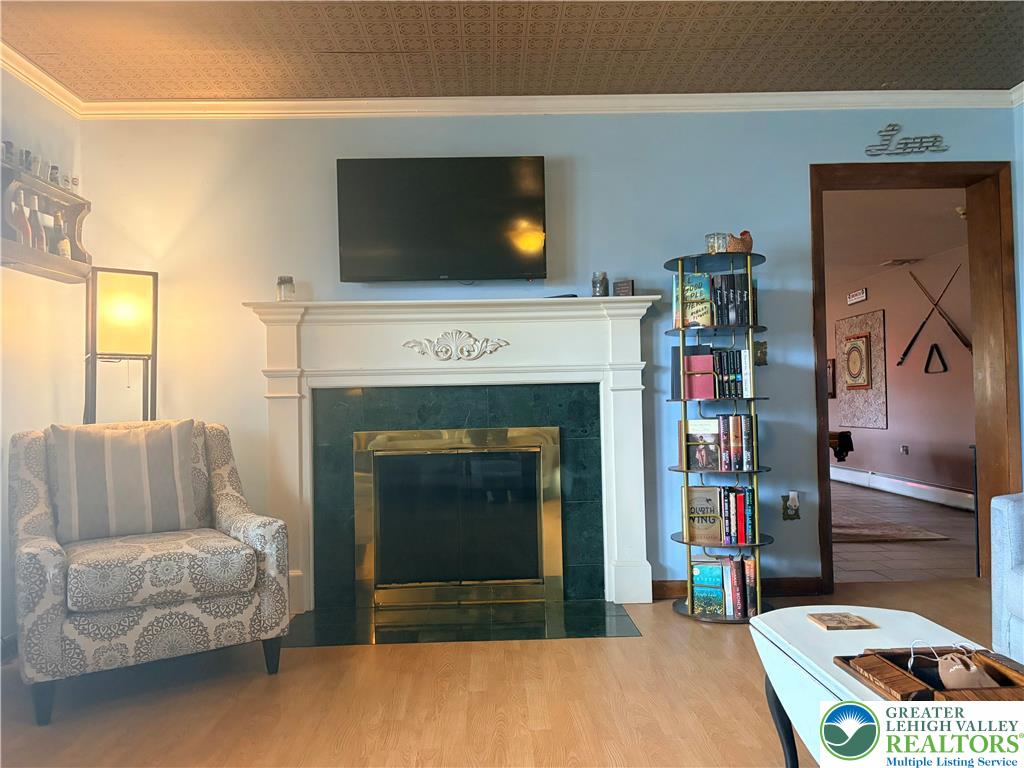 100 Hazelwood Road Lehighton, PA 18235 - Photo 9 of 31 a living room with furniture and a fireplace