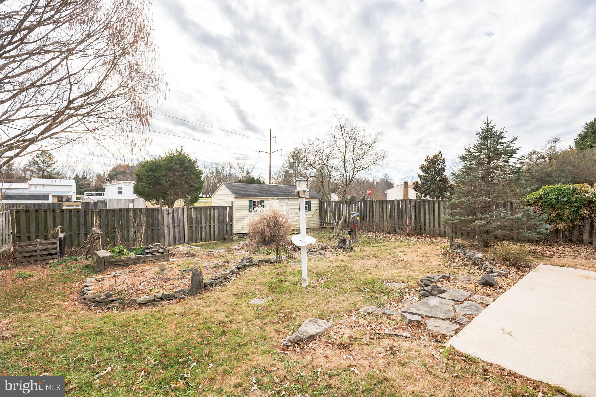 5911 Stephen Reid Road Huntingtown, MD 20639 - Photo 5 of 30 Right Side Yard