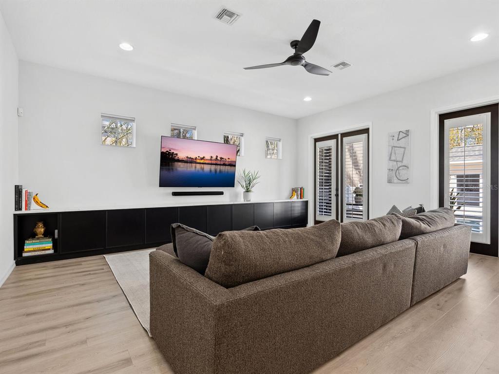 2159 Hawthorne Street Sarasota, FL 34239 - Photo 14 of 47 a living room with furniture and a flat screen tv