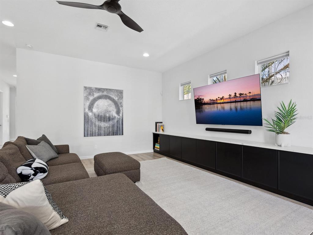 2159 Hawthorne Street Sarasota, FL 34239 - Photo 15 of 47 a living room with furniture potted plant and a lamp
