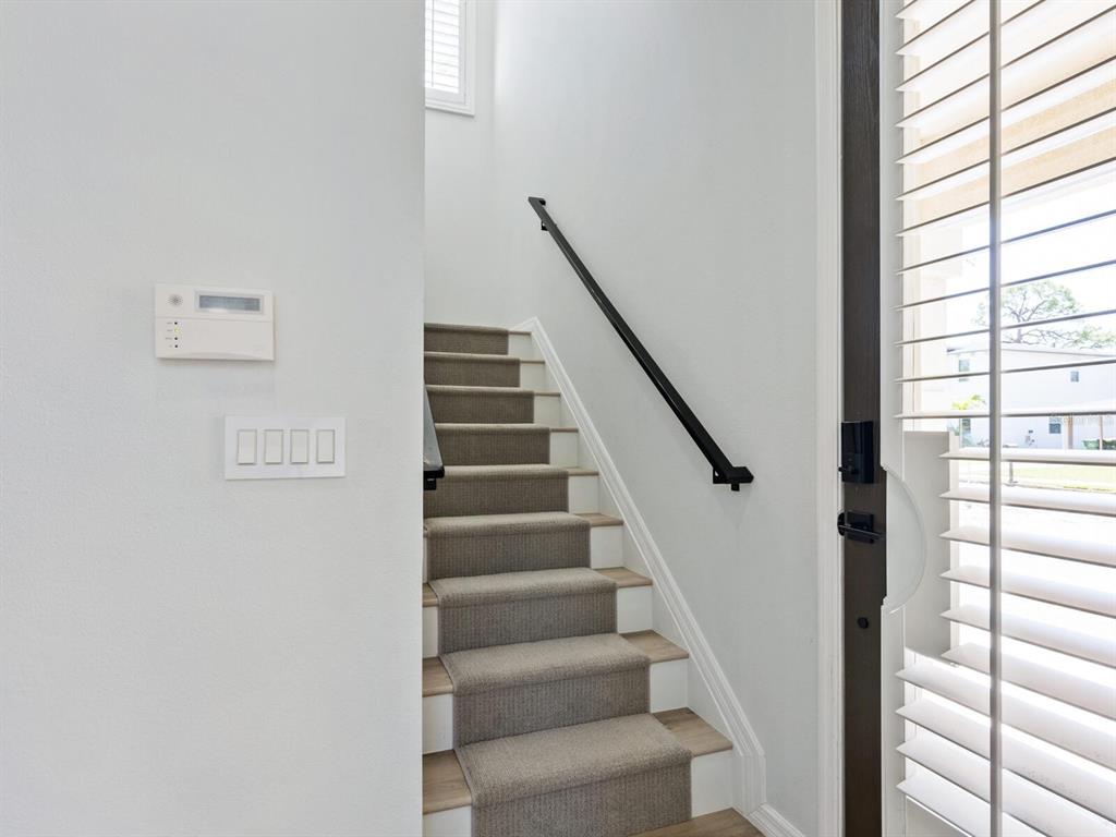 2159 Hawthorne Street Sarasota, FL 34239 - Photo 17 of 47 a view of staircase with black and white walls