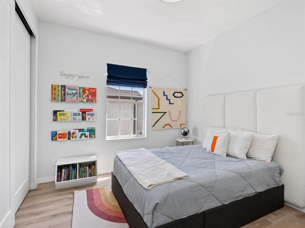 2159 Hawthorne Street Sarasota, FL 34239 - Photo 24 of 47 a bedroom with a bed and a window