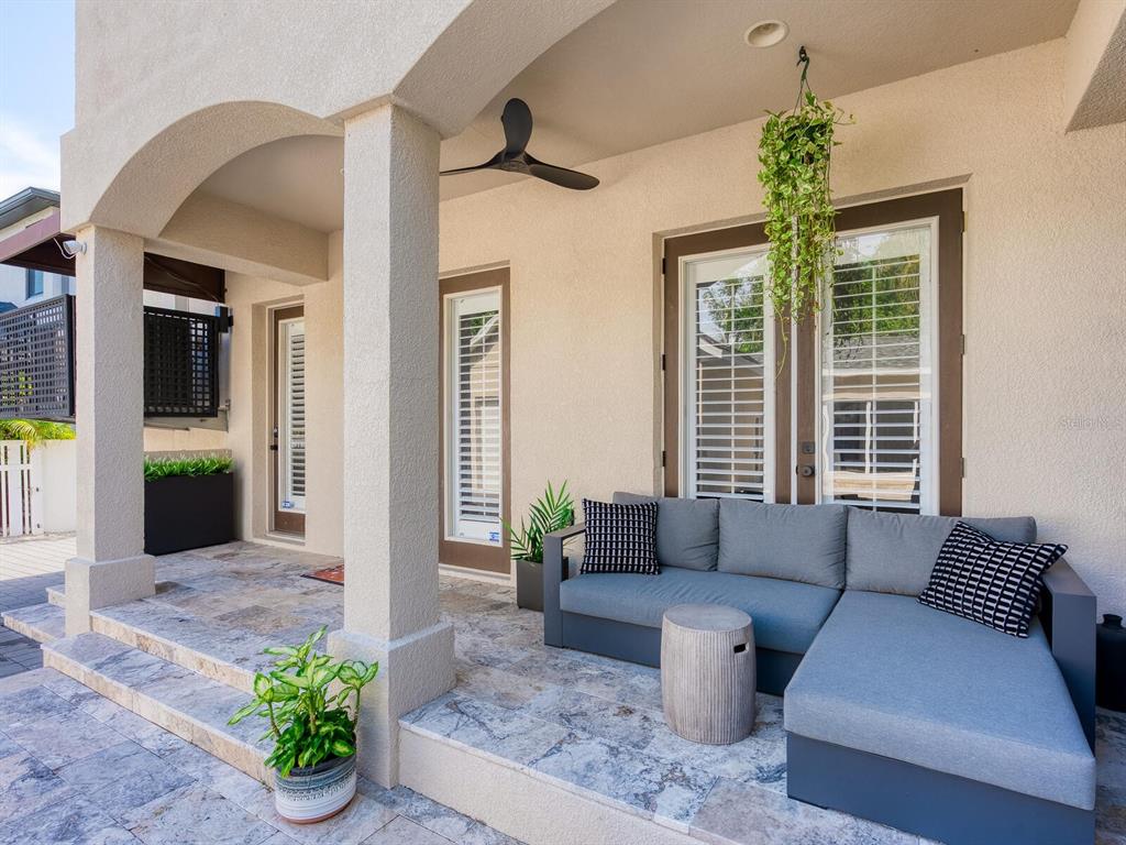 2159 Hawthorne Street Sarasota, FL 34239 - Photo 32 of 47 a living room with furniture and a potted plant
