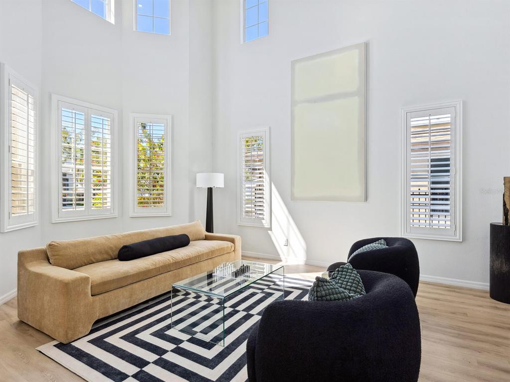 2159 Hawthorne Street Sarasota, FL 34239 - Photo 4 of 47 a living room with furniture and a window