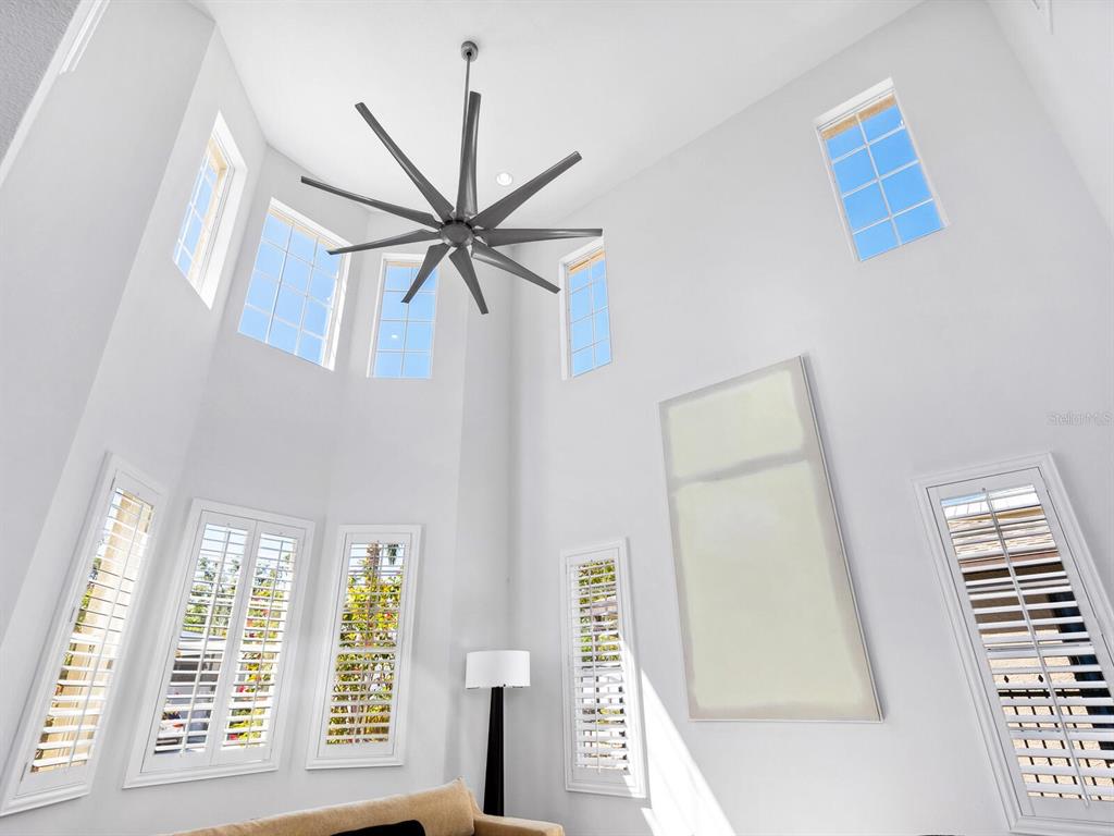 2159 Hawthorne Street Sarasota, FL 34239 - Photo 5 of 47 a view of a livingroom with a ceiling fan and window