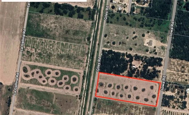 a view of a wooden fence