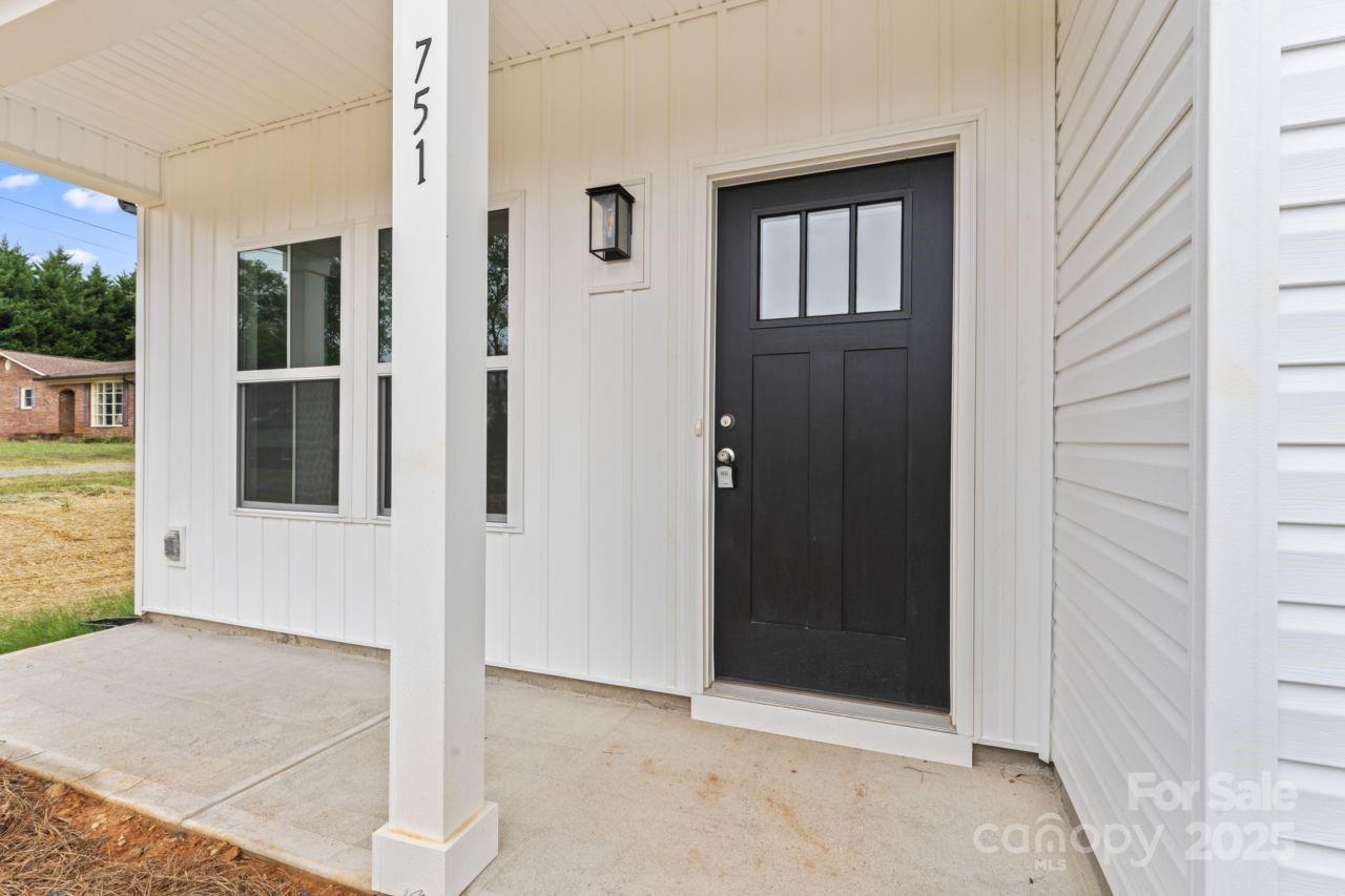 751 Mockingbird Road, Unit 1 Albemarle, NC 28001 - Photo 2 of 29 front view of a house with a glass door