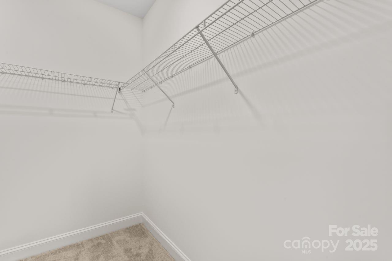 751 Mockingbird Road, Unit 1 Albemarle, NC 28001 - Photo 28 of 29 a view of a room with racks on the wall