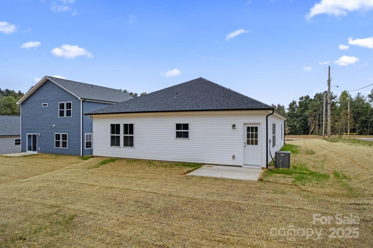 751 Mockingbird Road, Unit 1 Albemarle, NC 28001 - Photo 6 of 29 a house view with a garden space