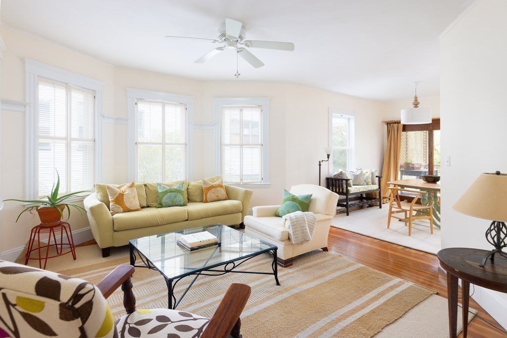 a living room with furniture or couch and a window