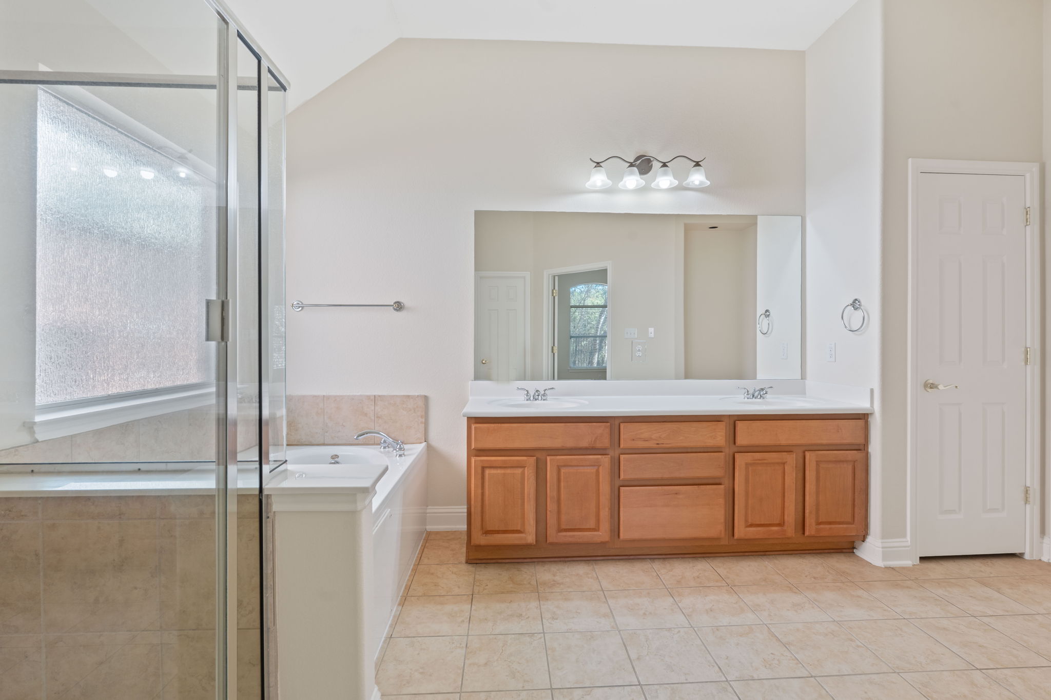 738 Nelson Ranch Road Cedar Park, TX 78613 - Photo 21 of 35 Full bath featuring a bath, a sink, tile patterned flooring, and a shower stall