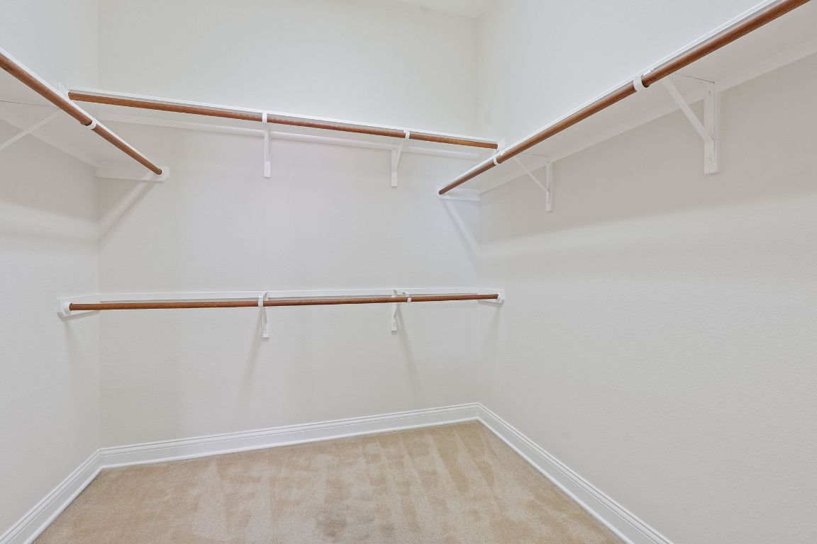 738 Nelson Ranch Road Cedar Park, TX 78613 - Photo 24 of 35 Walk in closet featuring light colored carpet