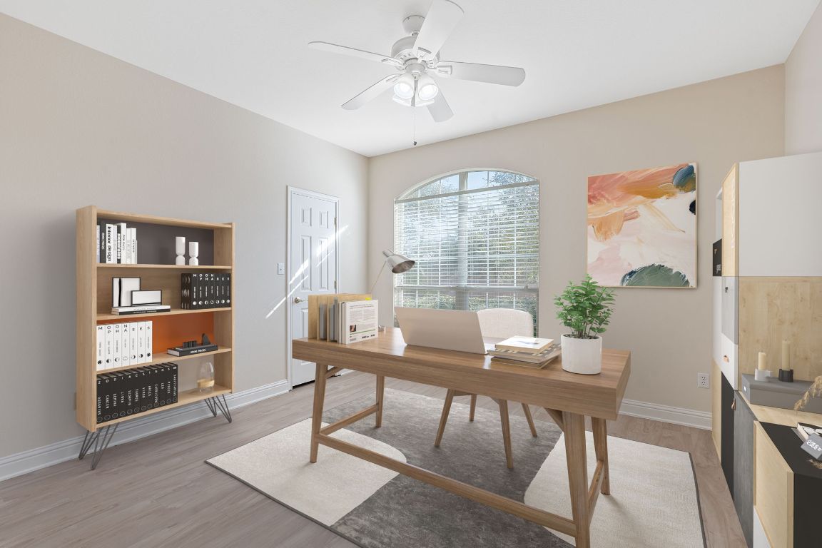 738 Nelson Ranch Road Cedar Park, TX 78613 - Photo 3 of 35 Home office featuring baseboards, light wood-style flooring, and a ceiling fan