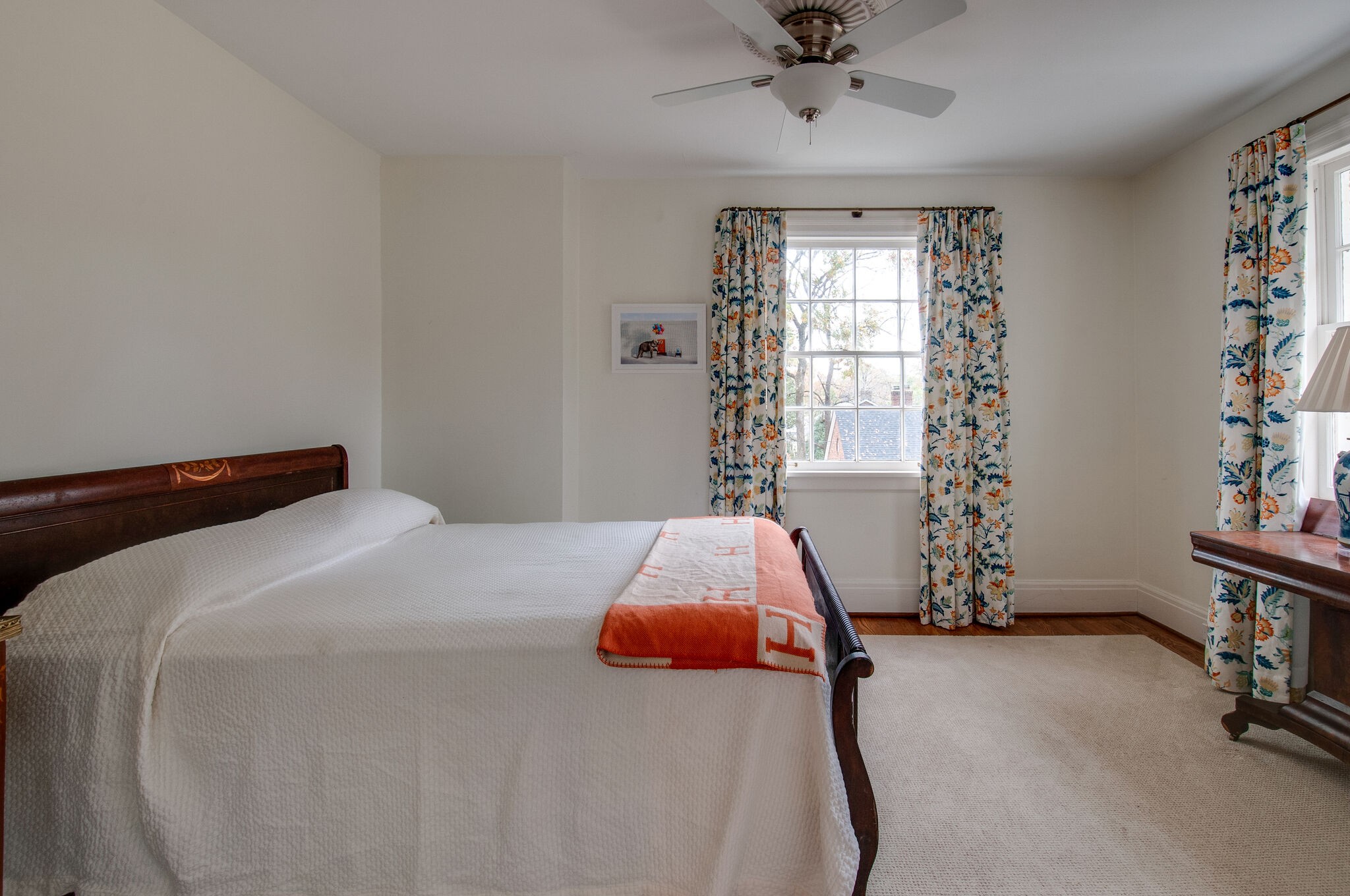 4309 Estes Road Nashville, TN 37215 - Photo 14 of 23 a bedroom with a bed and a chandelier