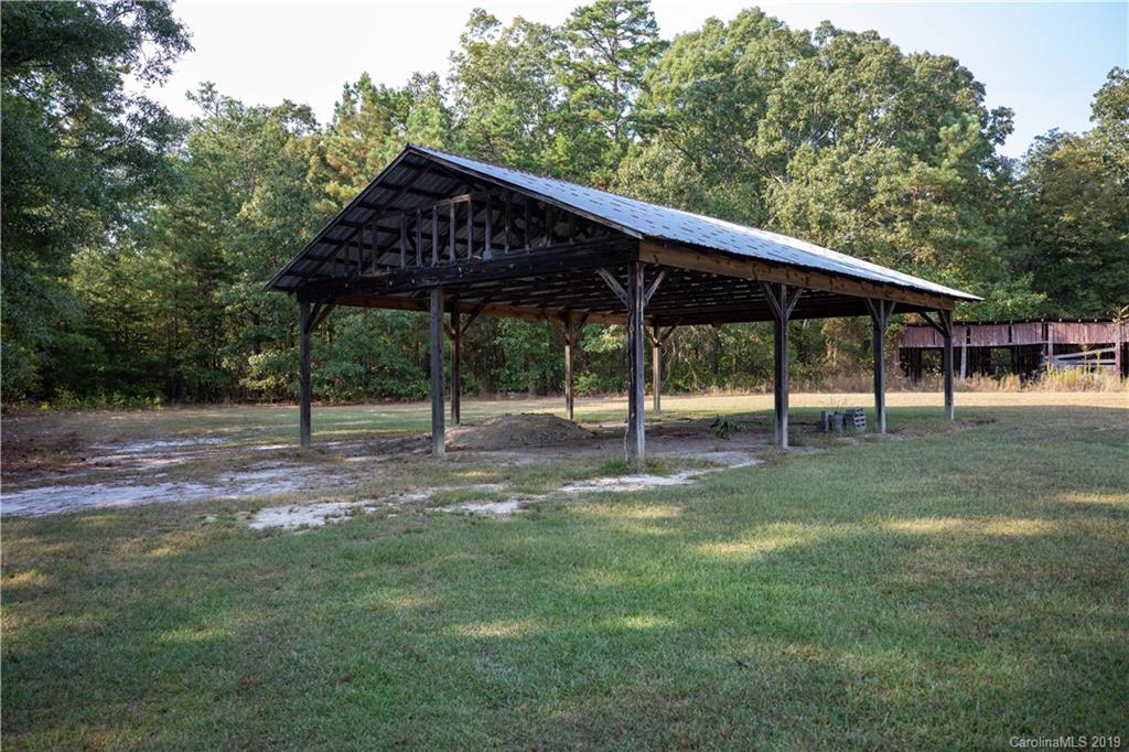 453 State Rd S-46-422 Clover, SC 29710 - Photo 3 of 20 a view of a wooden deck and a yard