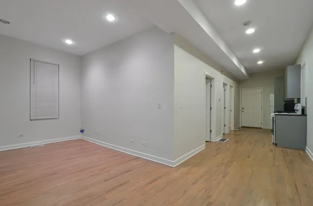 a view of a livingroom with wooden floor